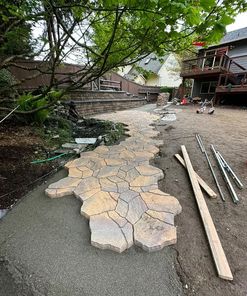 Installation of natural Grass, Retaining wall construction & Fire Pit in Lake Stevens 